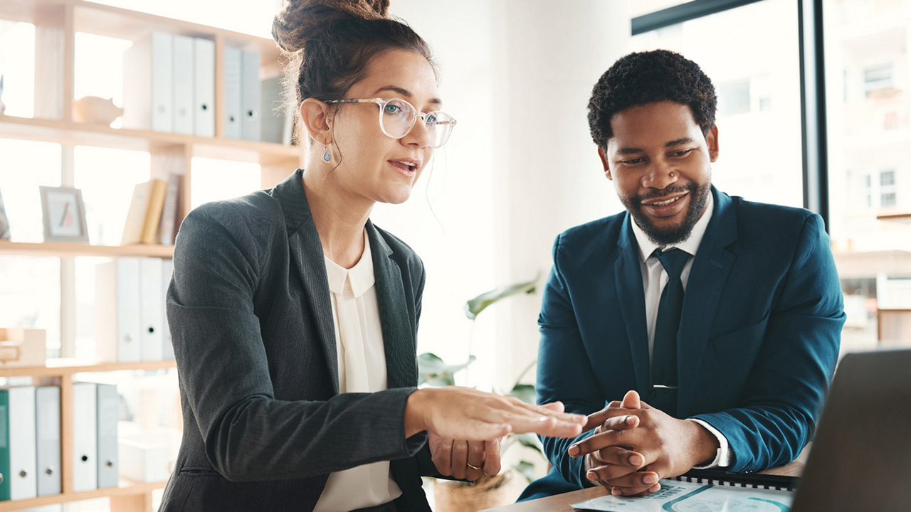 Employees Discussing Work