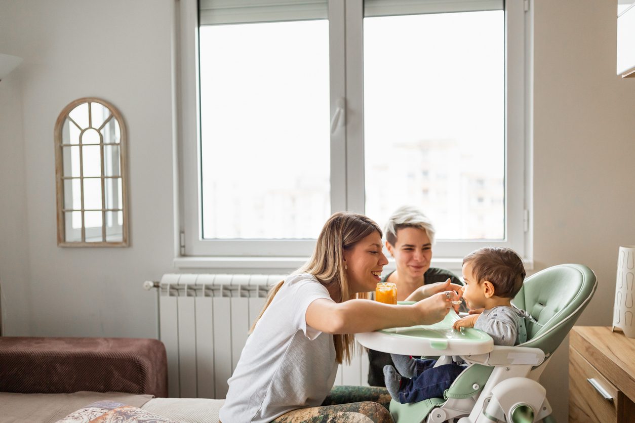 female couple with their child