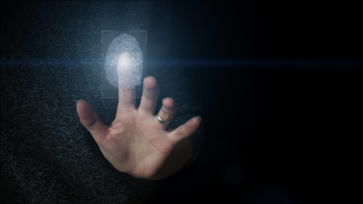 A person's hand with a glowing light on it.