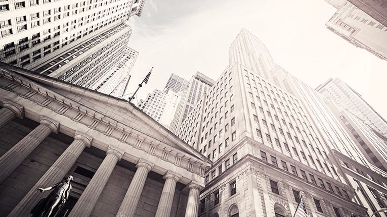 A black and white photo of the new york stock exchange.