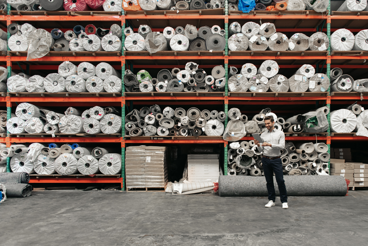 Man standing warehouse working