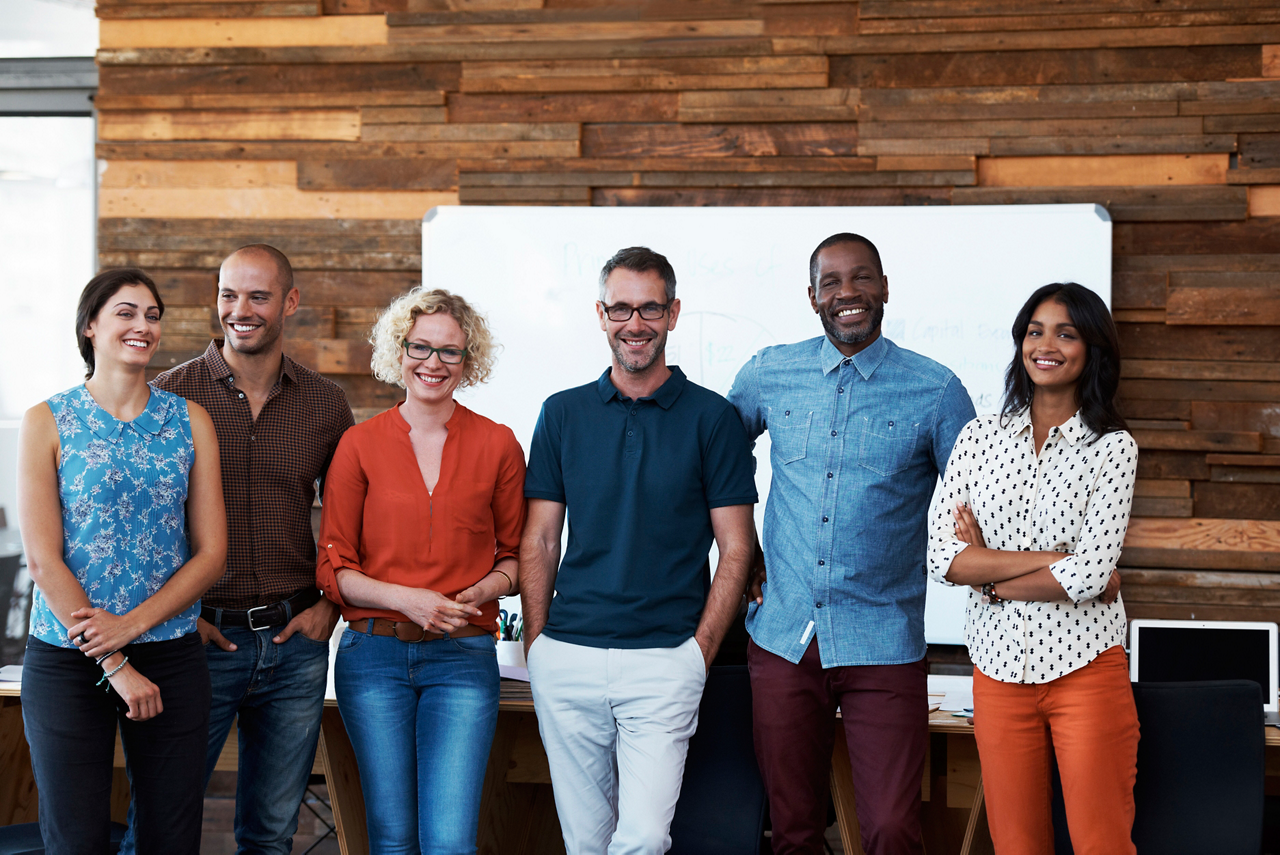 Colleagues smiling group shot