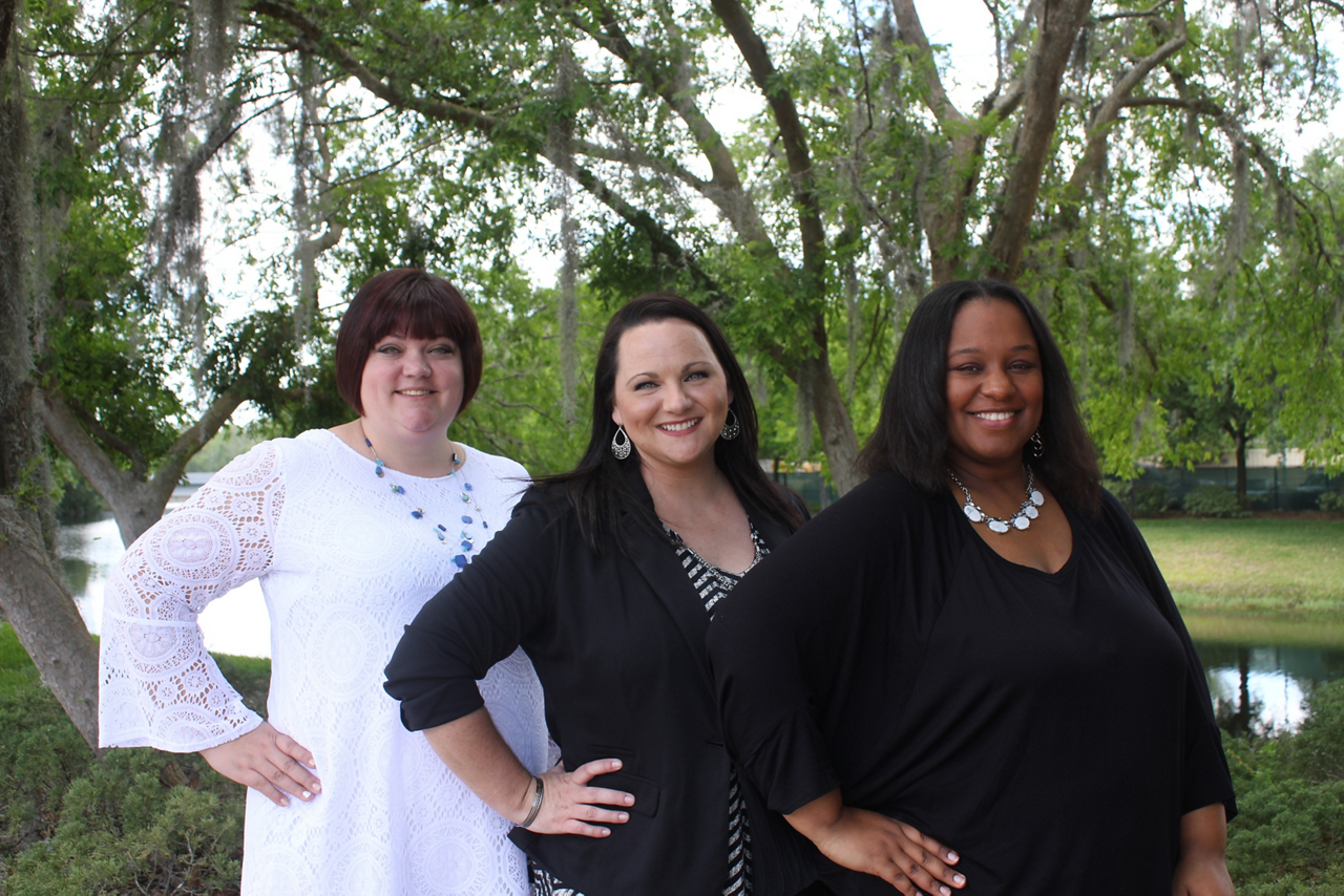 Three woman smiling