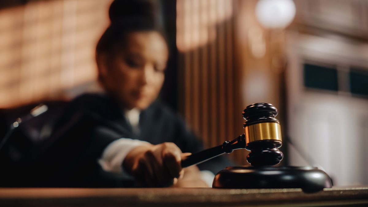 A judge bangs their gavel. 