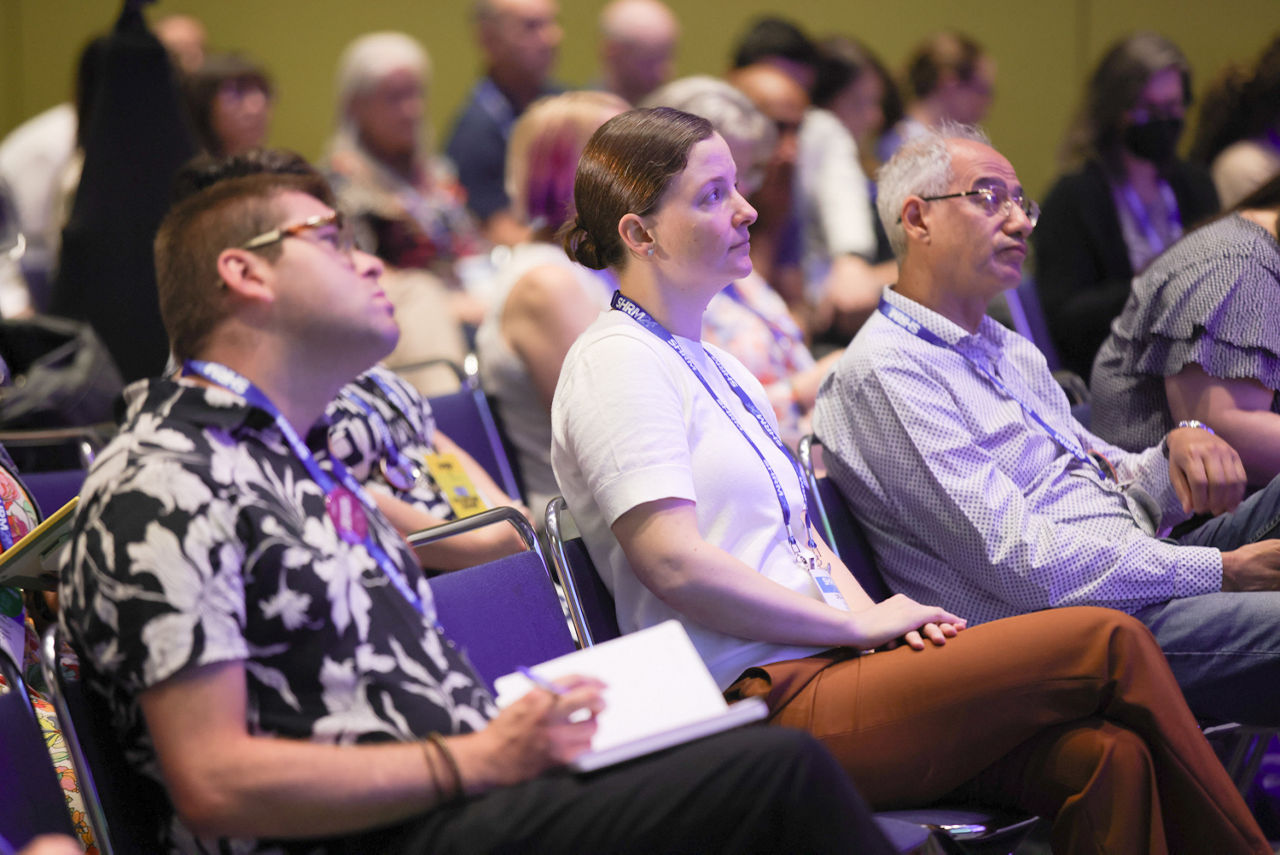 SHRM24 attendees watch a concurrent session
