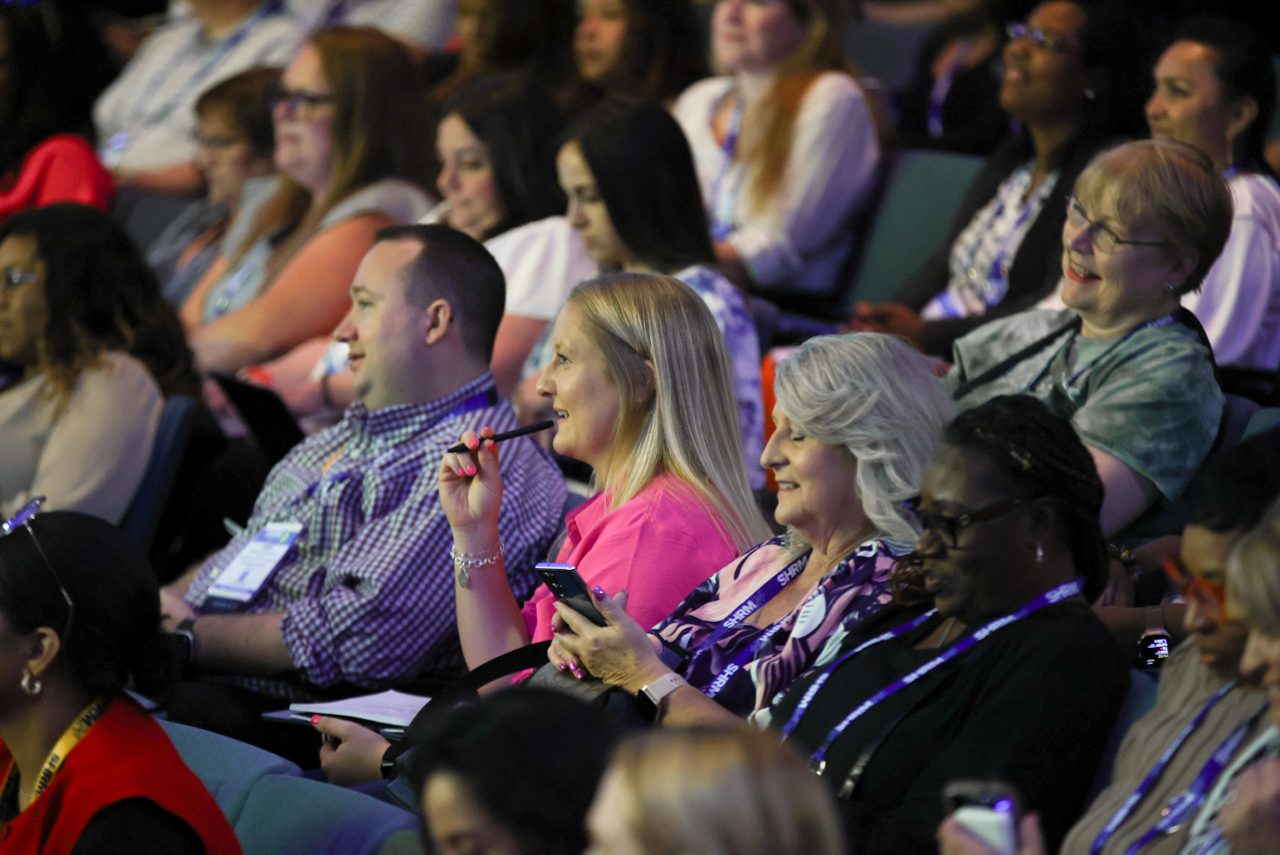 Conference attendees watch a session live at SHRM24 in Chicago