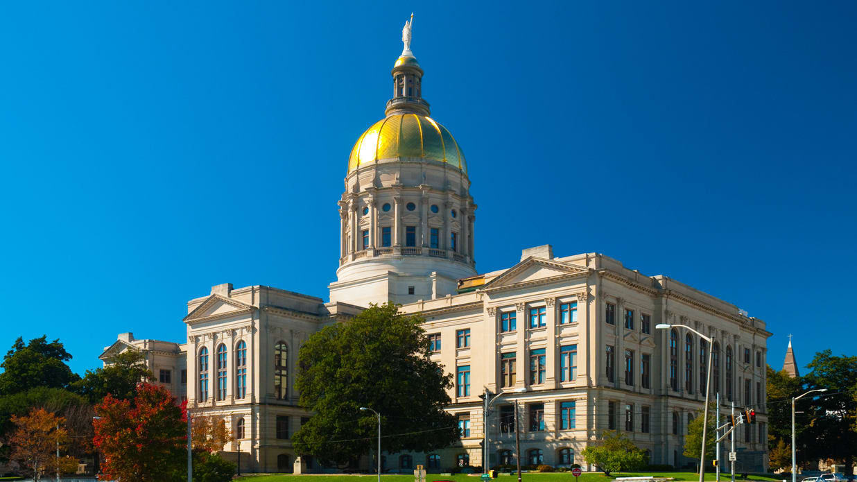 A large building with a golden dome in the background.