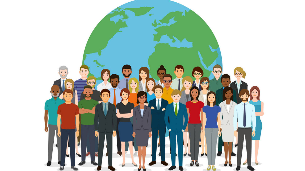 A group of people standing in front of a globe.