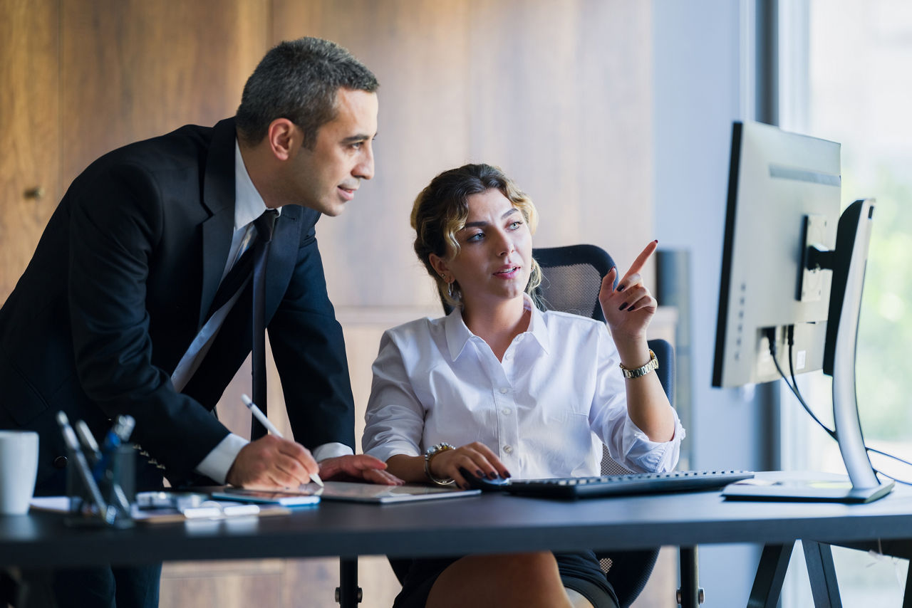Young Entrepreneur Business People Discussing On Their Project In The Office