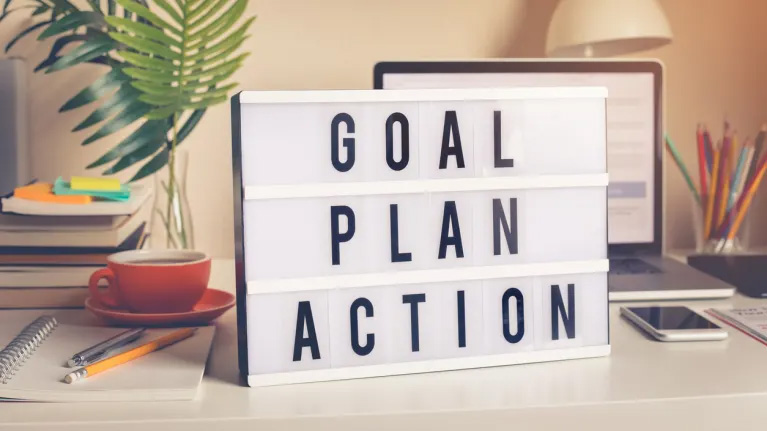 What is the difference between a strategic plan and a tactical plan?