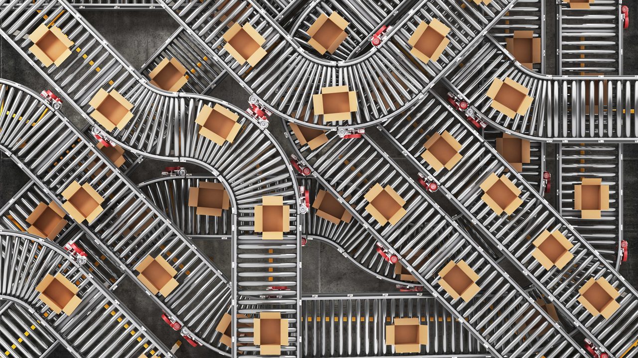 An image of a conveyor belt with boxes on it.