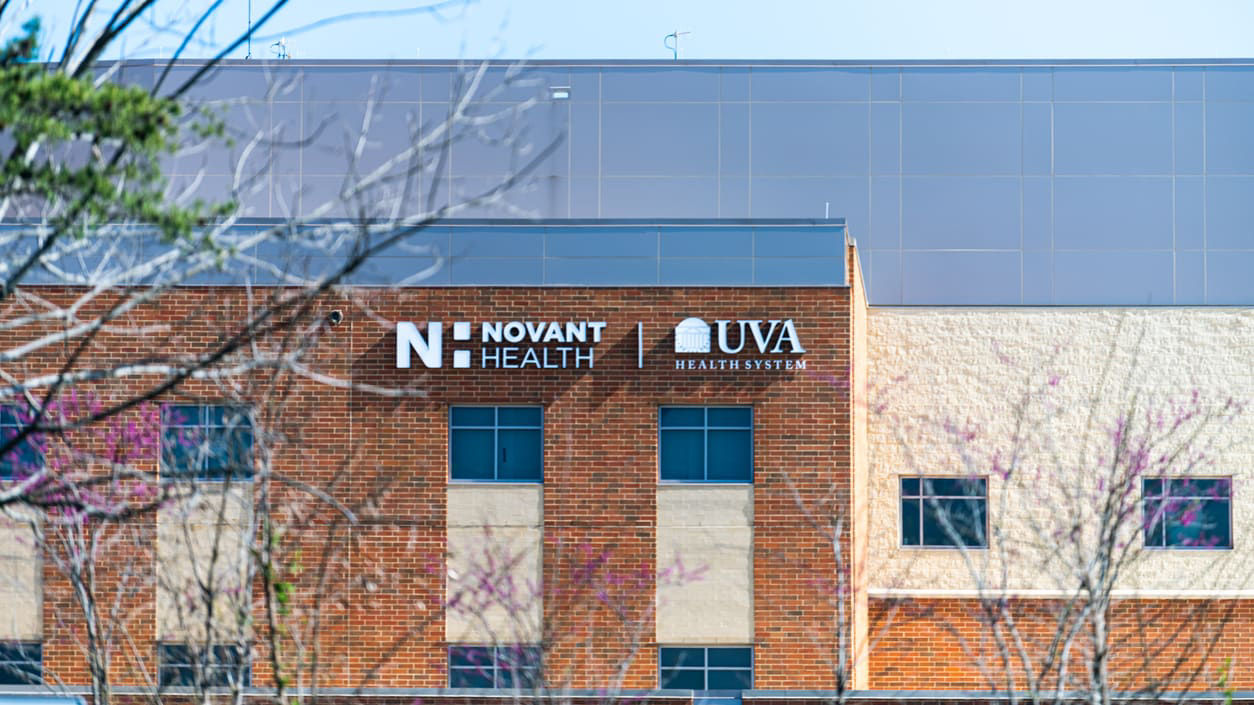 A building with a sign that says nvu health.