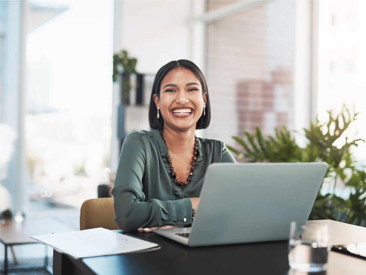 smiling woman on laptop