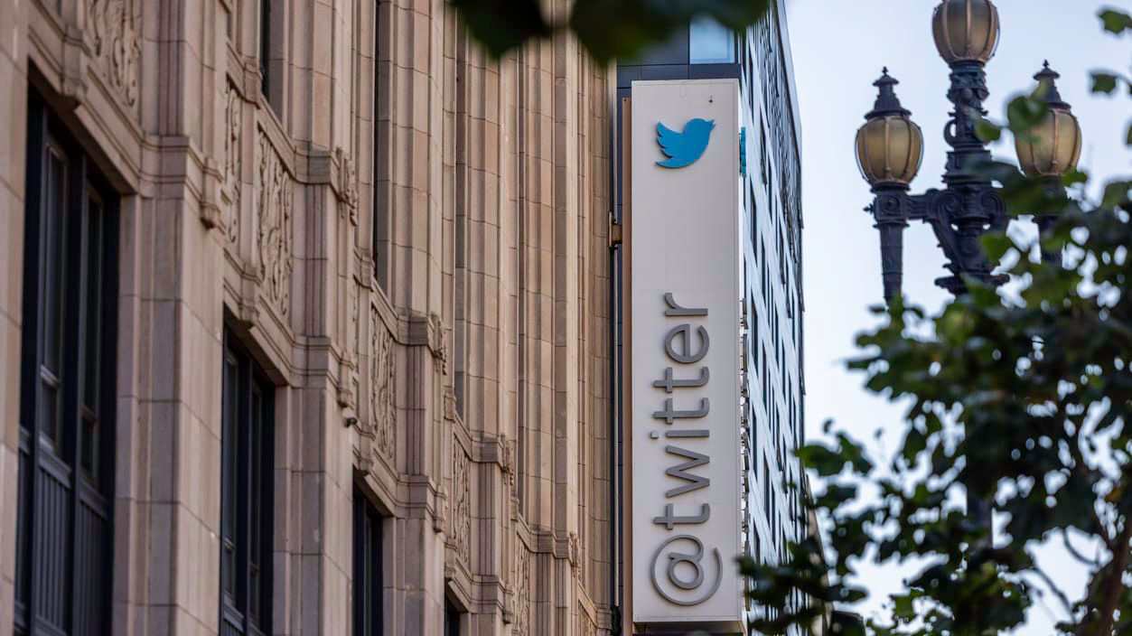 The twitter logo is seen on the side of a building in san francisco, california.