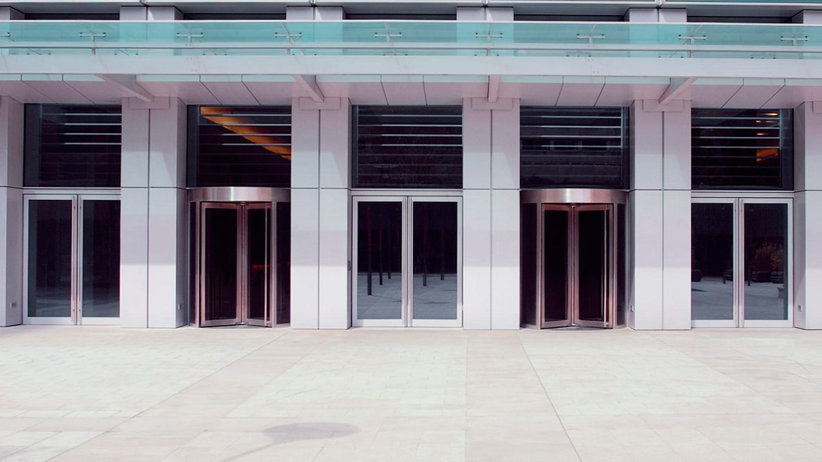 A large building with glass doors.