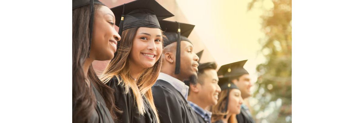 A group of graduates in graduation gowns.