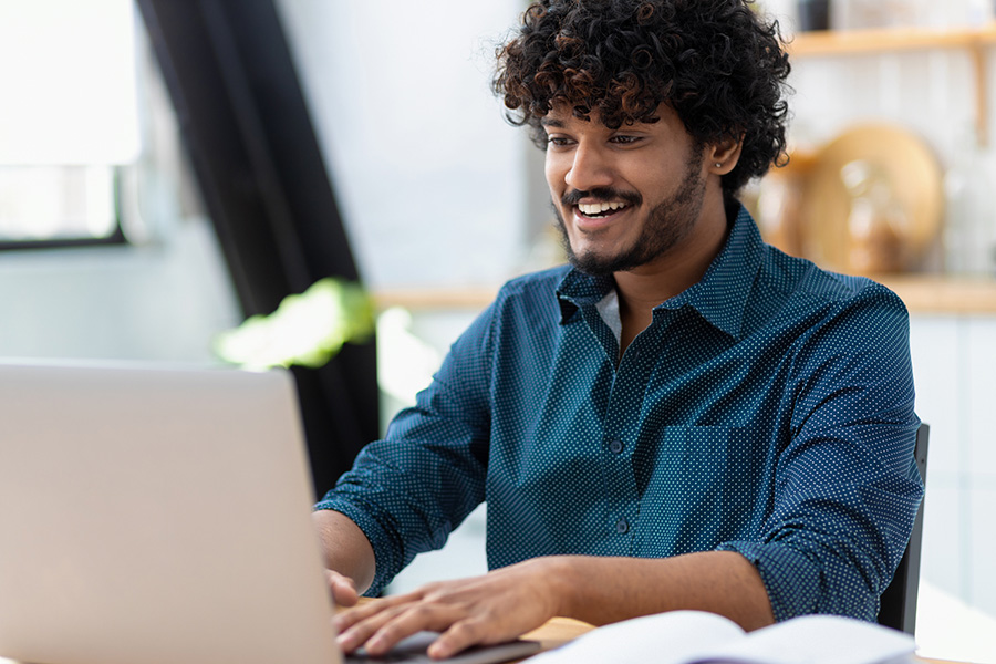 Happy student attending online training course