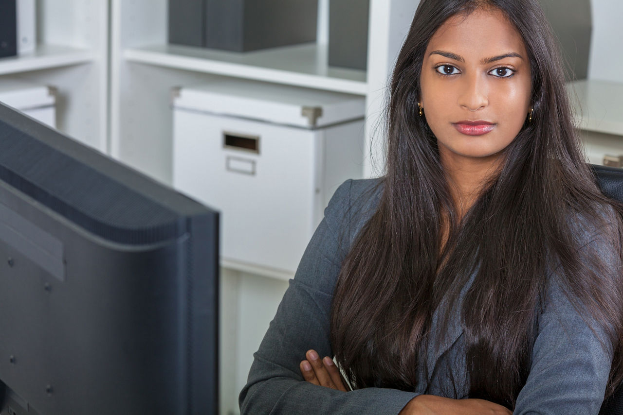 A worker at her computer.
