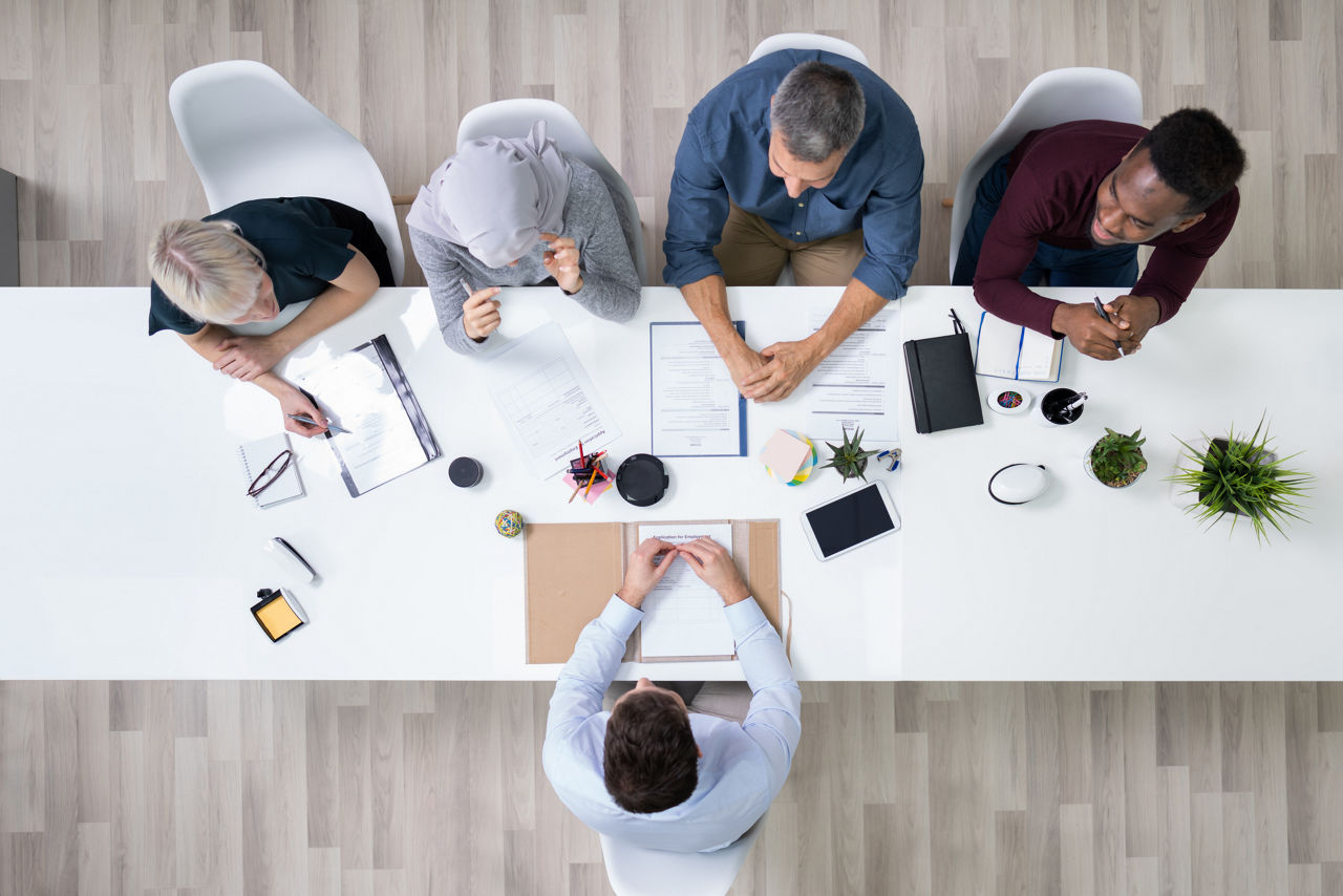 view from above Business People conducting An Interview In Office