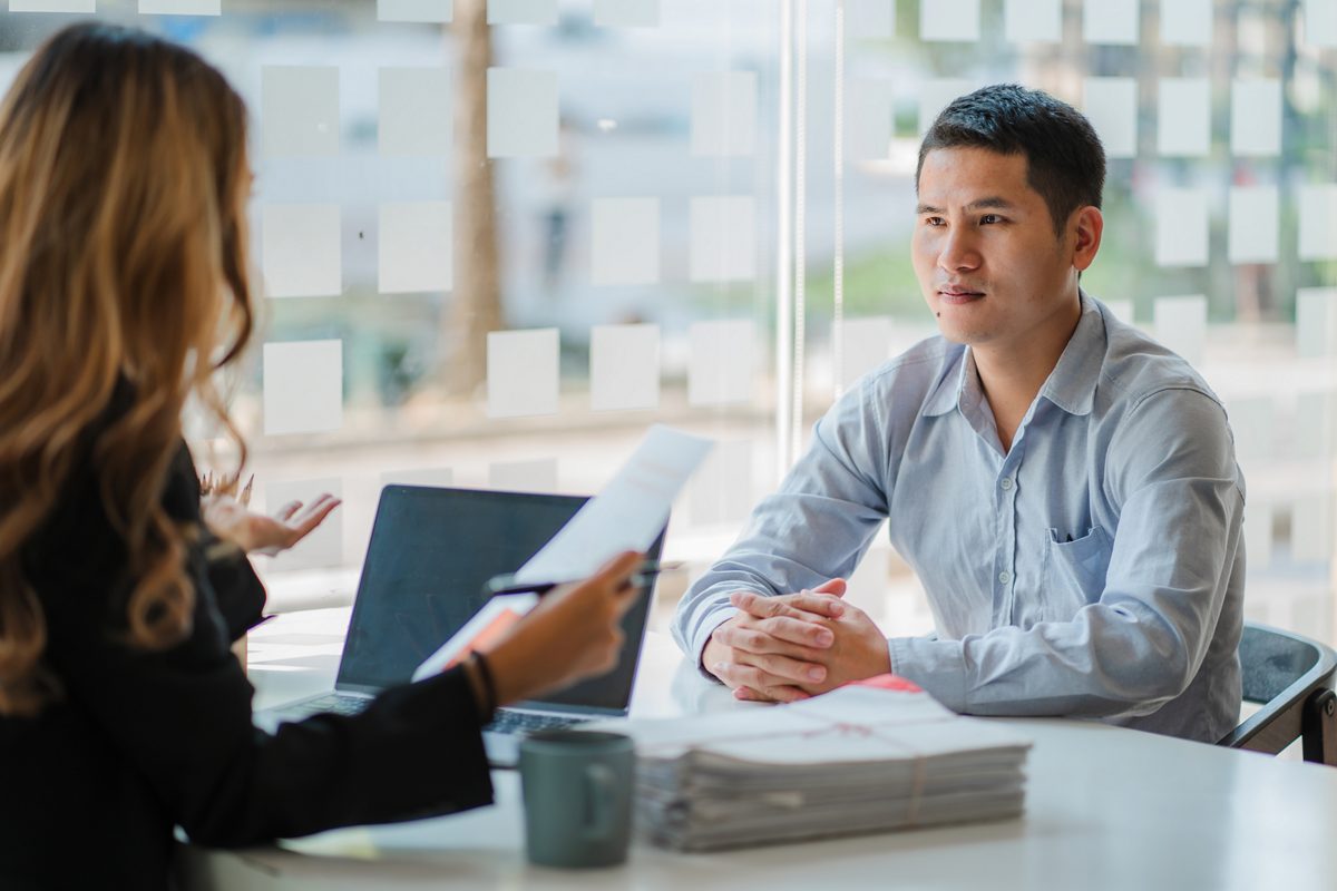 Man sits during interview.