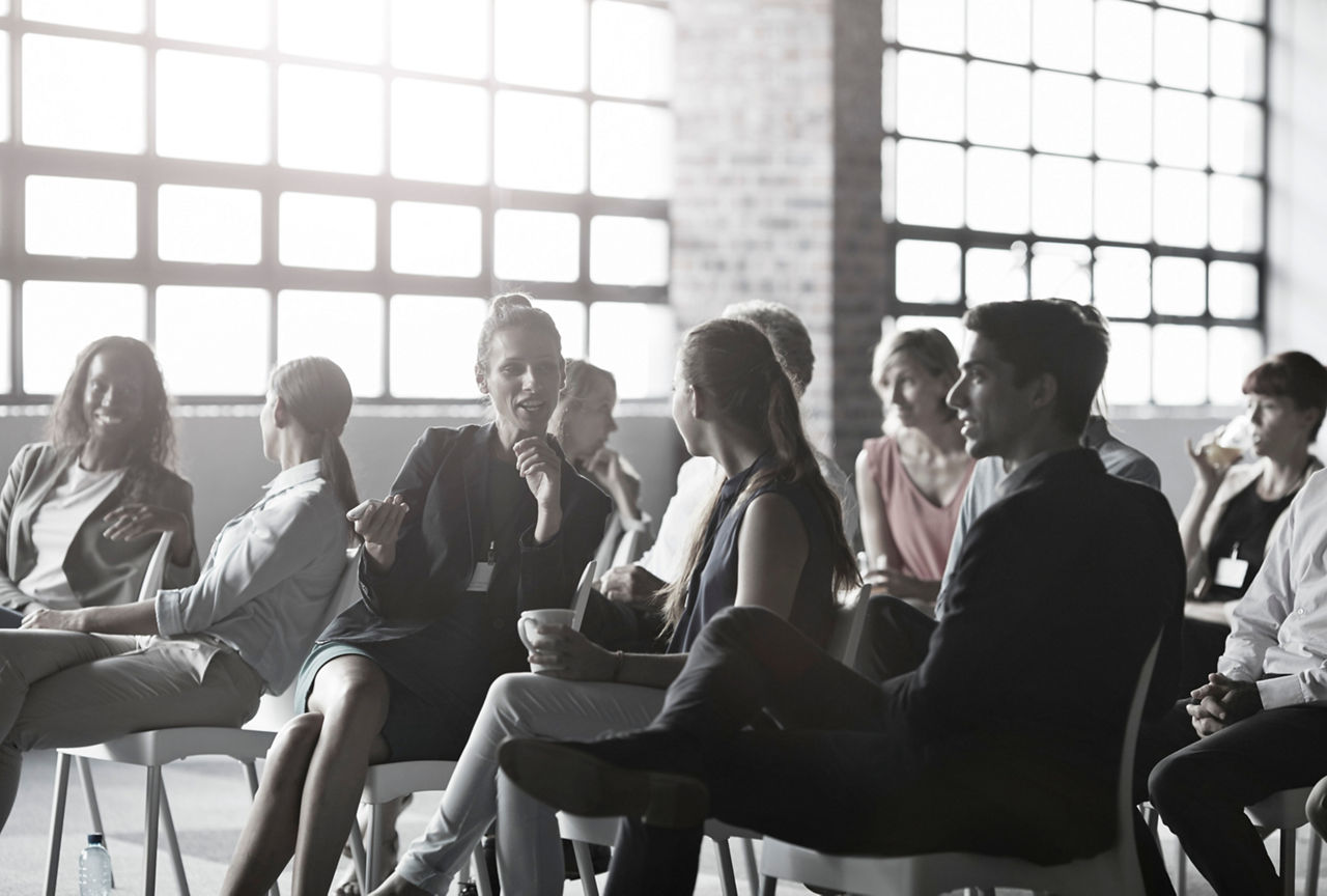 Large group of business people in conversations