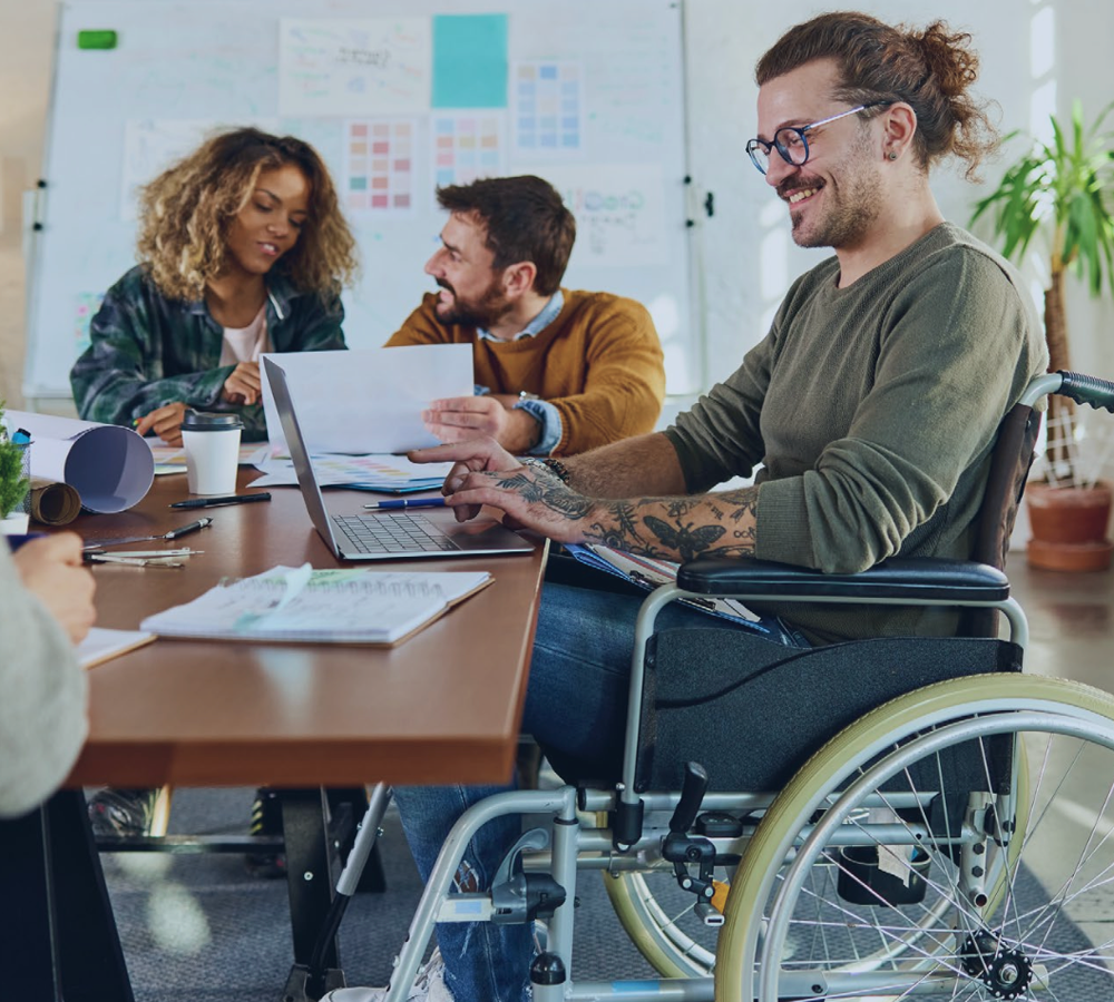 Office scene with employees of varying diversities.