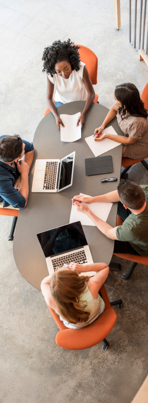 Overhead photo of office workers having a meeting