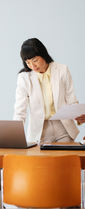 business woman looking at laptop