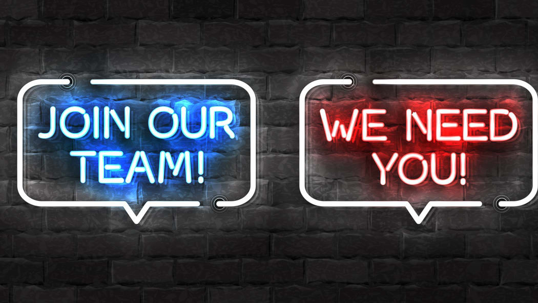 Three neon signs that say we need hiring team you.