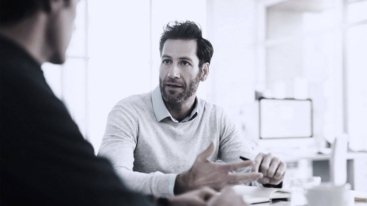 Manager giving feedback to an employee