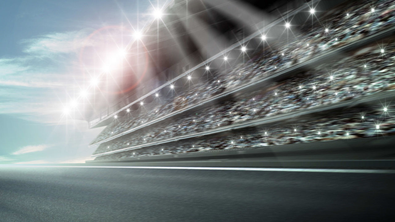 An image of a race car driving down a track.