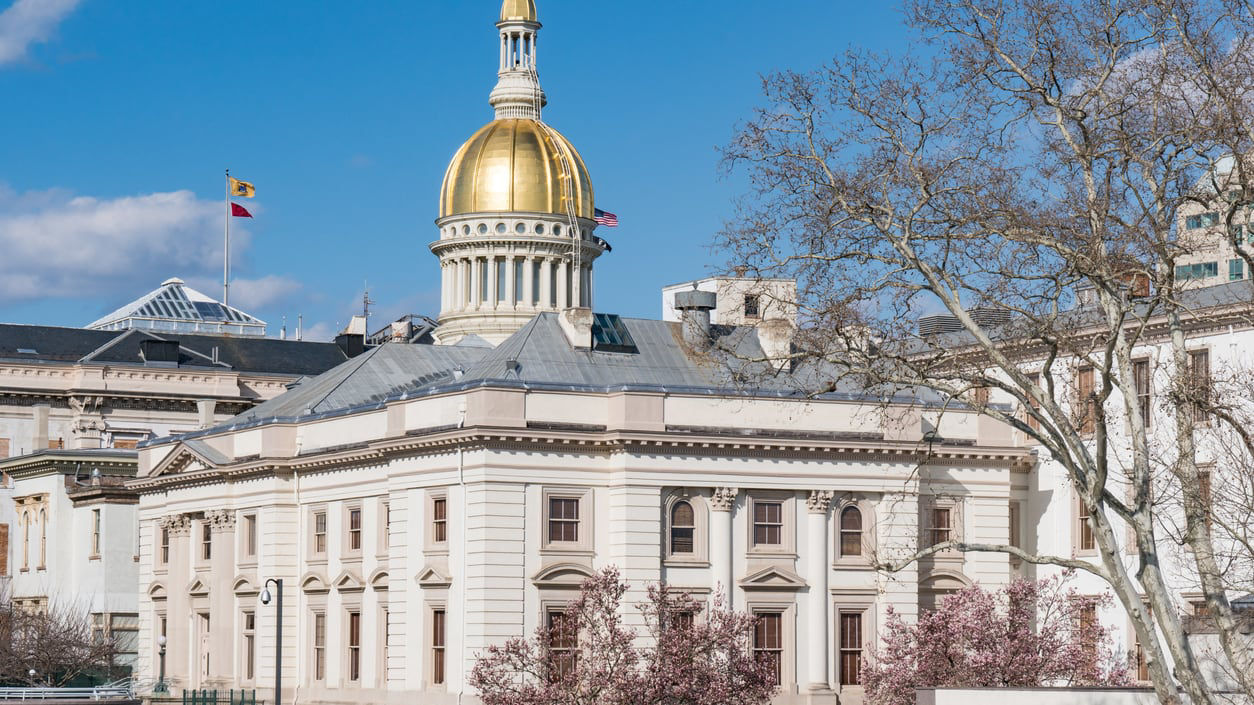 A building with a golden dome in the background.