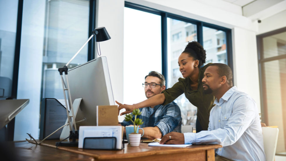 Group of workers collaborating on a project
