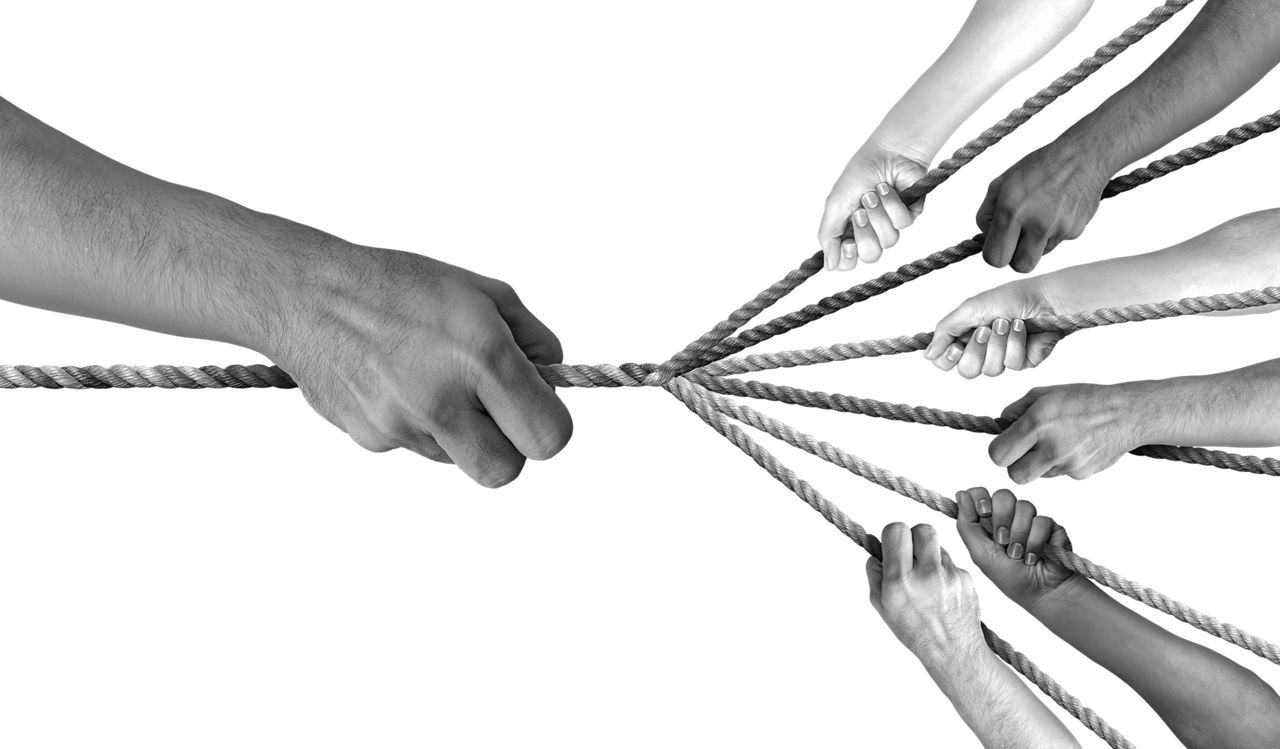 hands pulling on rope