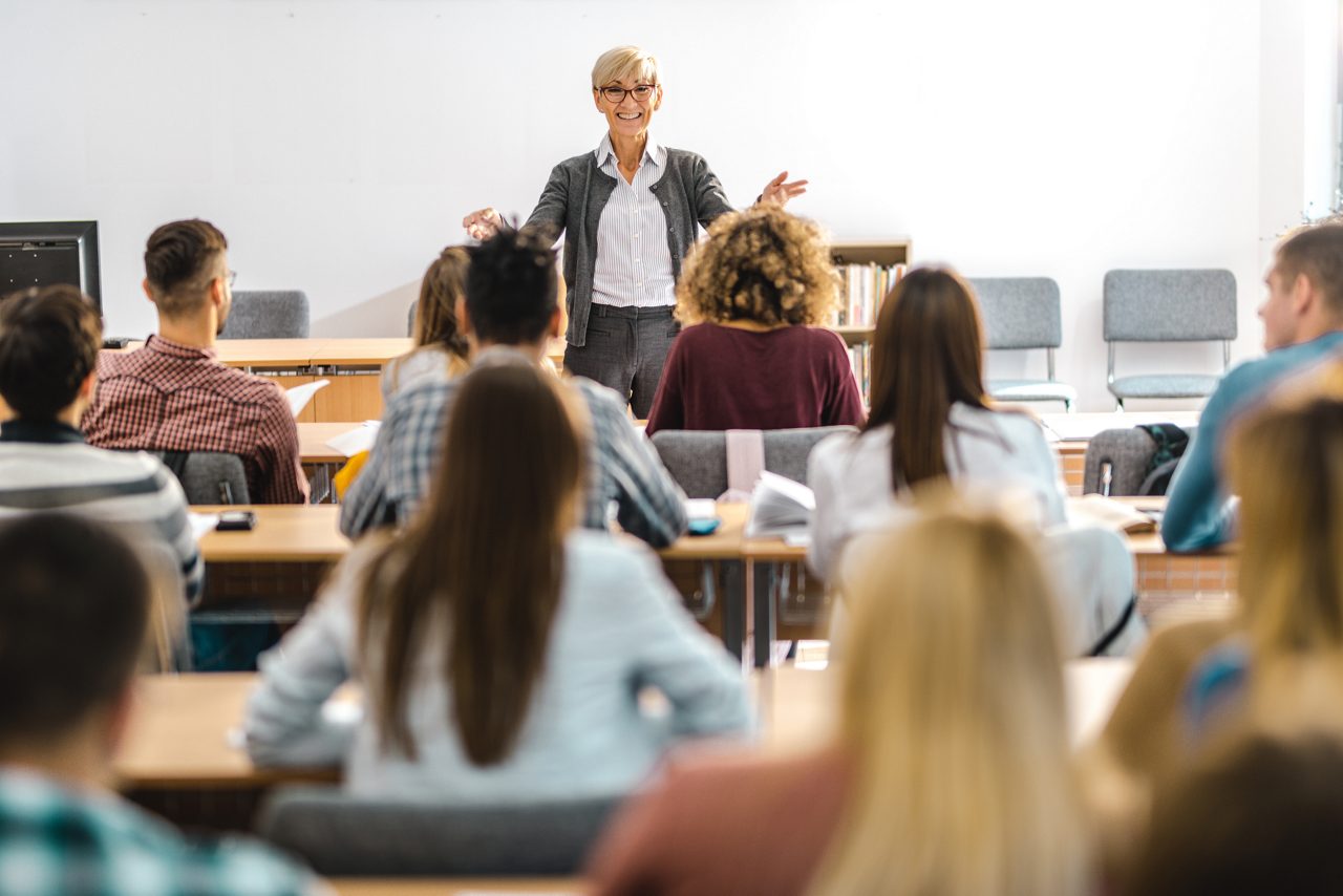 Female professor leading classroom discussion