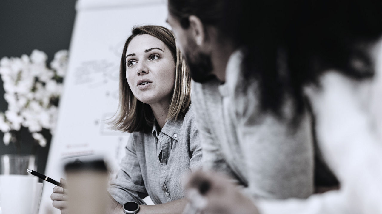 woman speaking in a business meeting