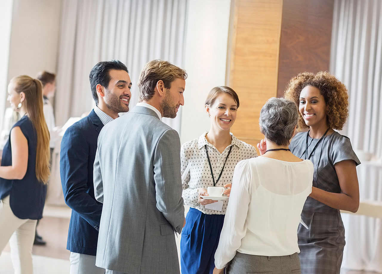 Business people at conference.