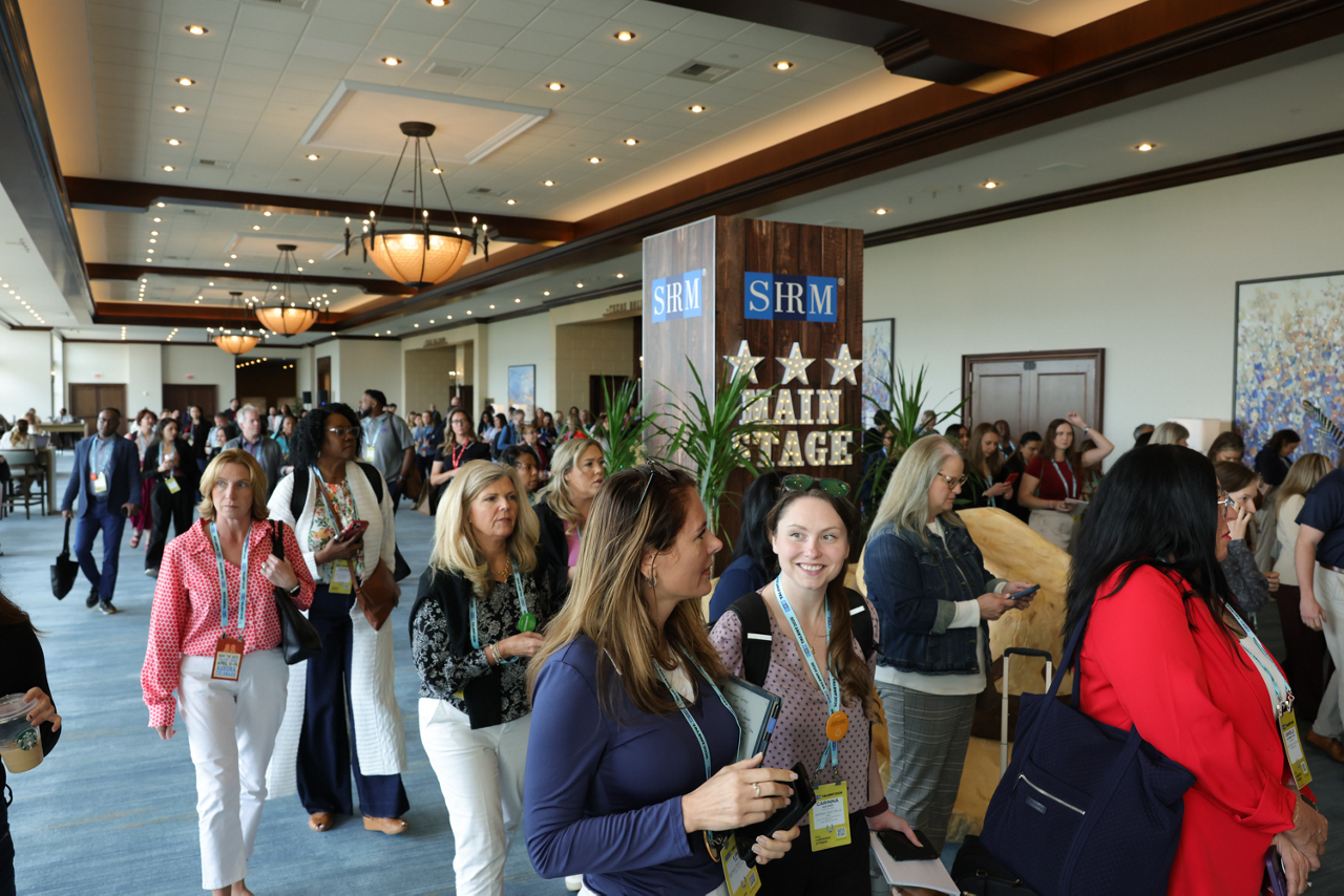 Conference attendees walking to the next breakout session.
