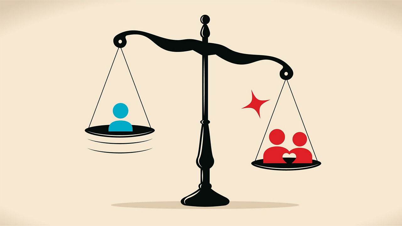 A man and a woman on a balance scale.