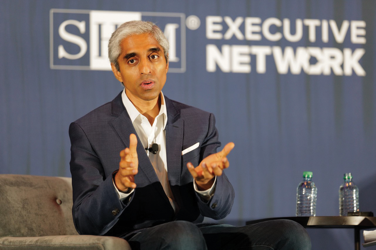 Vivek Murthy speaking on stage