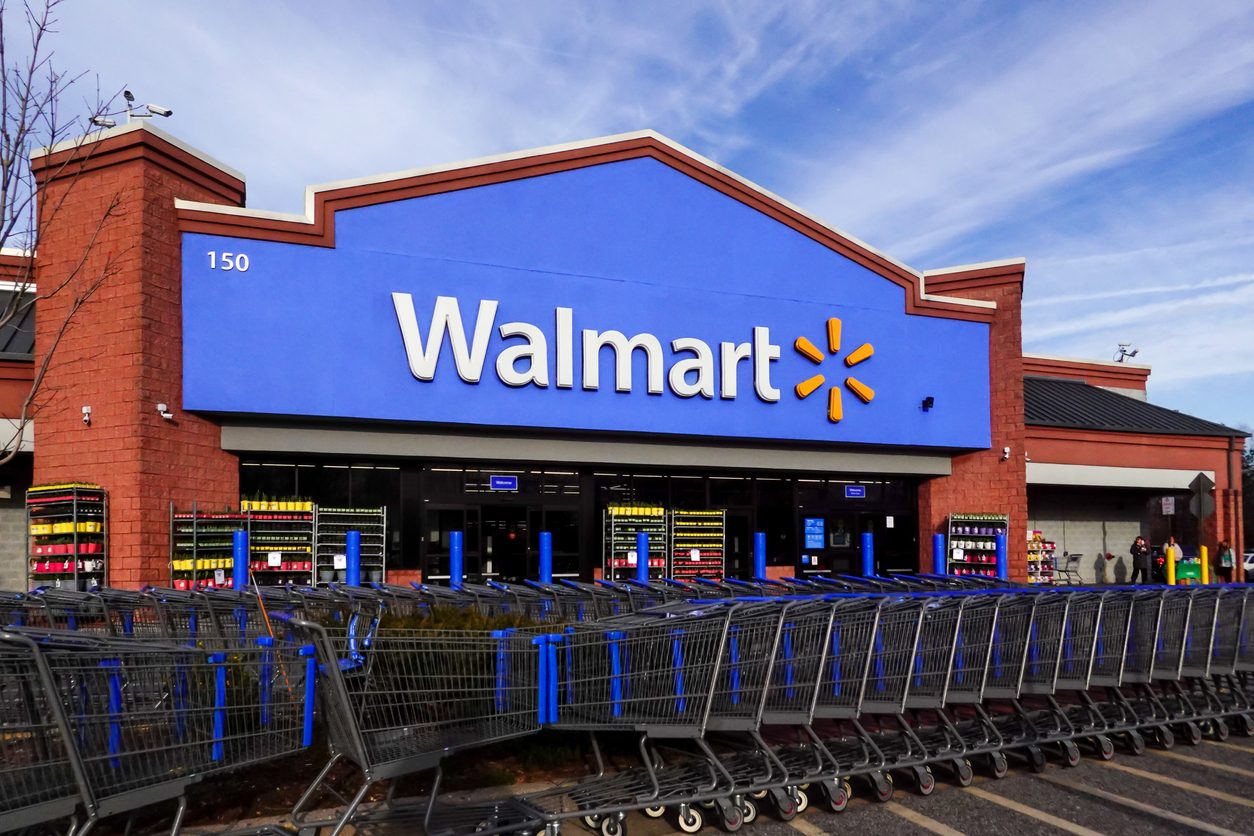 Entrance of a Walmart with shopping carts in front