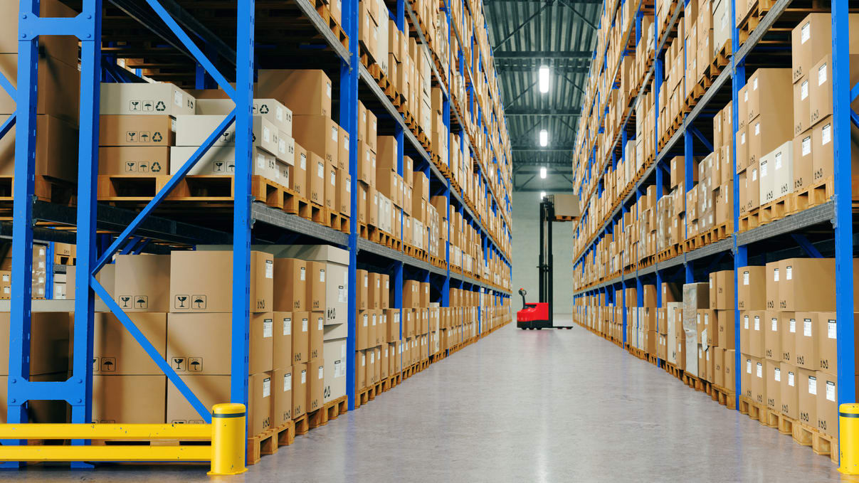 A lot of boxes in a warehouse.