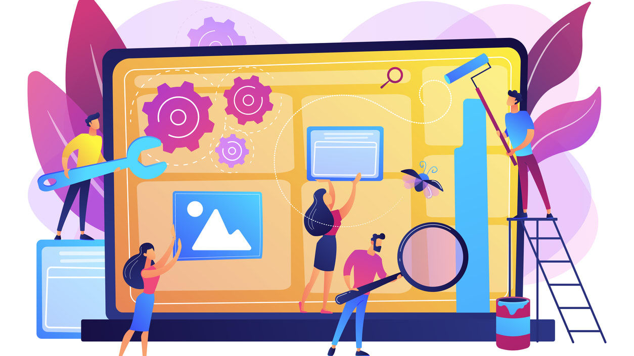 A group of people working on a computer screen.