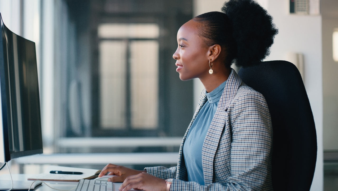 Business, black woman and pc with typing, internet and research for article, online reading and email for report. Person, accountant and employee with connection and approval for salary increase