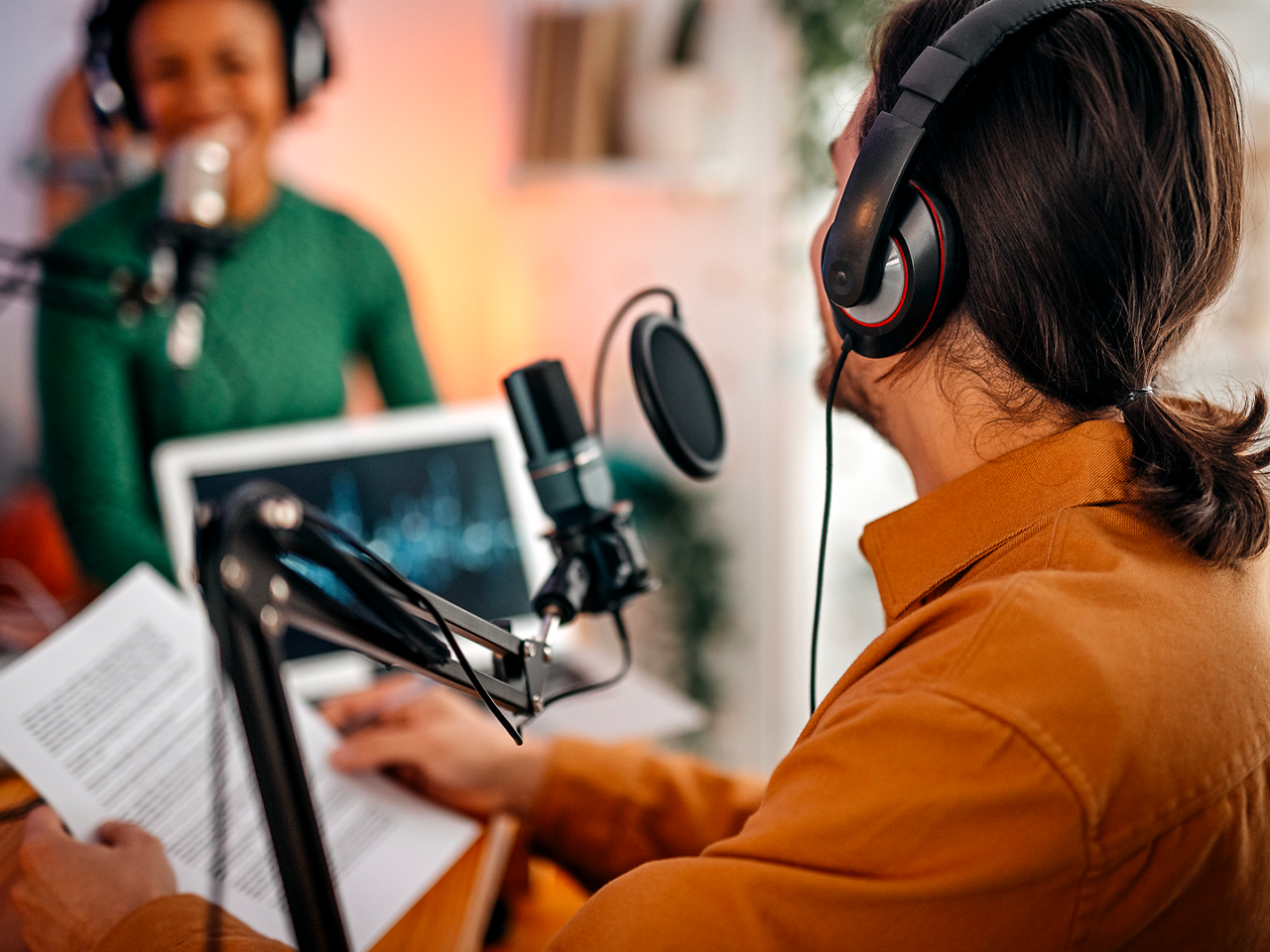 Man records podcast