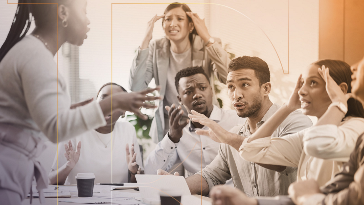 A group of coworkers having a heated argument in an office meeting.