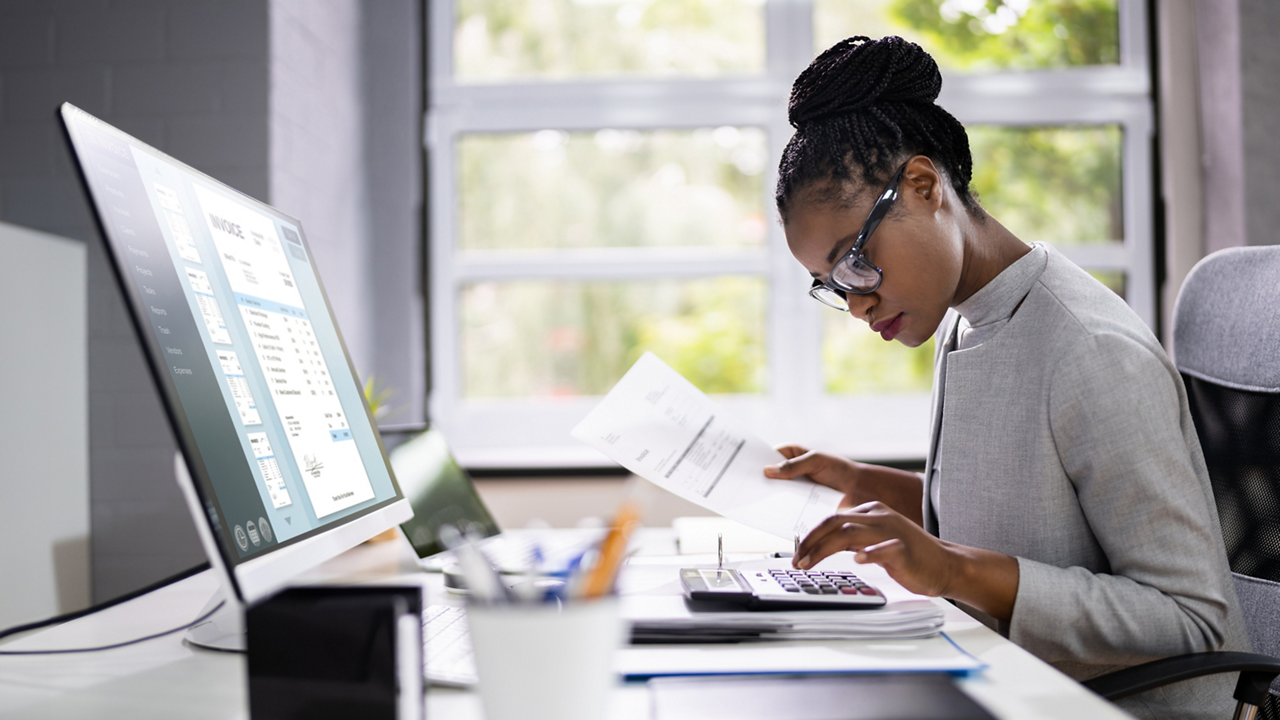 Accountant Using Electronic Invoice Or Bill In Cloud