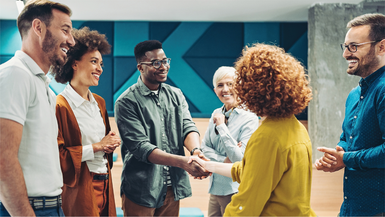a group of people shaking hands