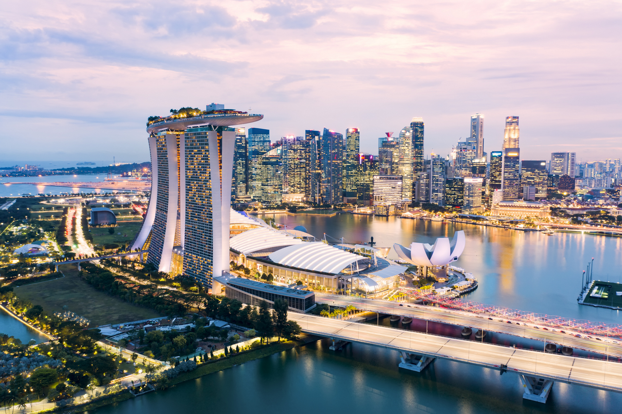 Singapore, July 18, 2020. Aerial view of the skyline of Singapore during a beautiful sunset with the financial district in the distance. Singapore is a sovereign island in Southeast Asia.