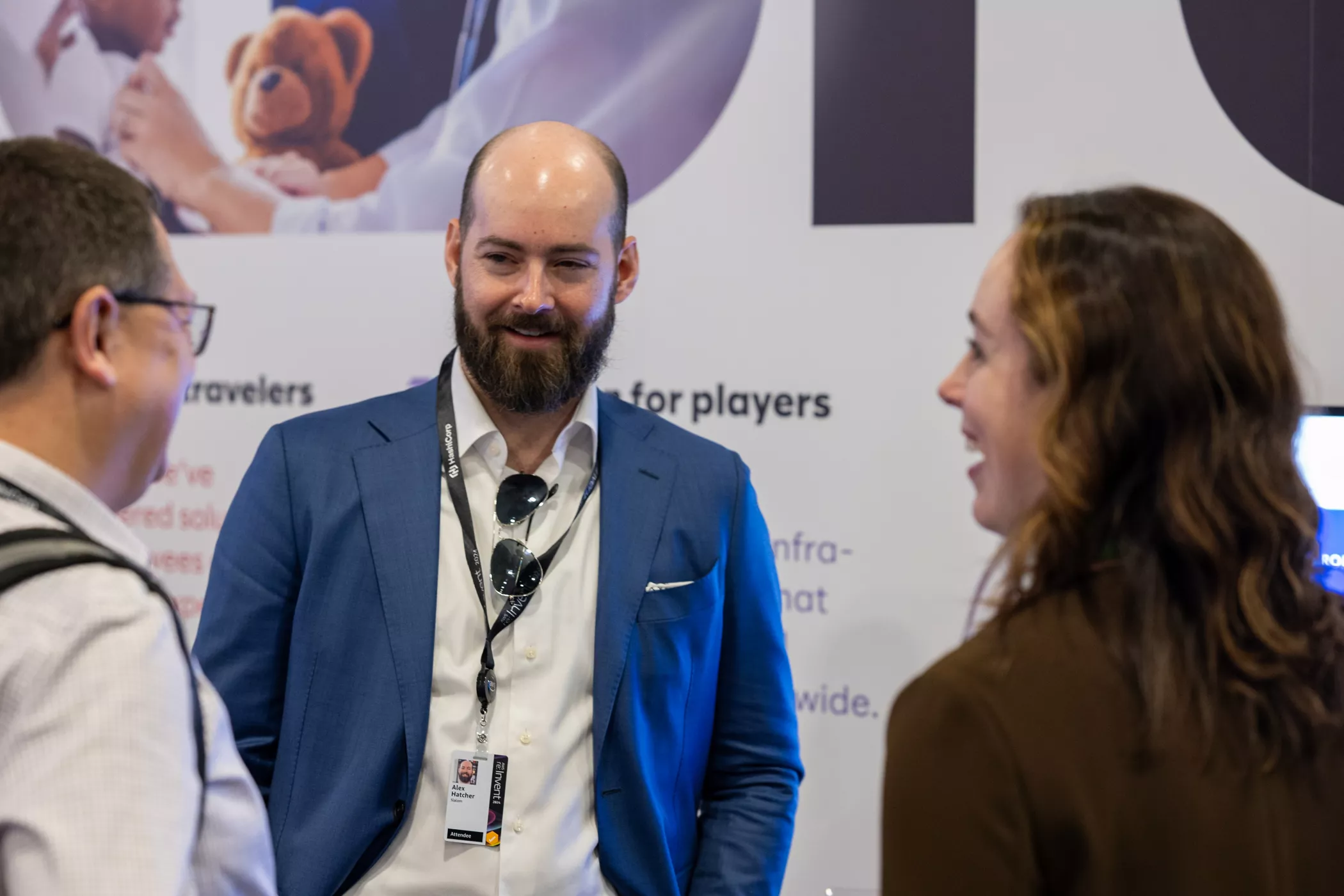 Three people in conversation at re:Invent